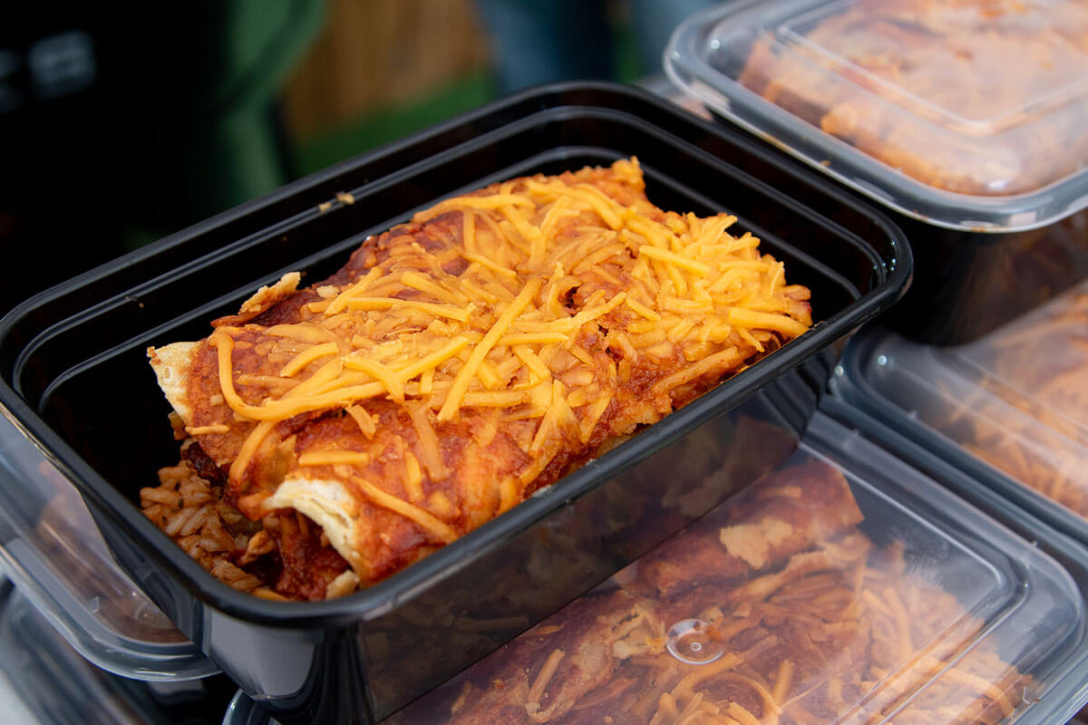 smoked cheesy enchiladas in easy meal prep containers for quick lunches or dinners